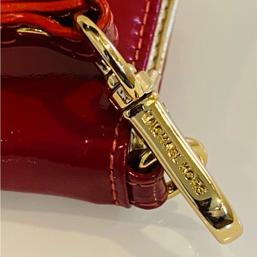 Michael Kors Glossy Red Wristlet with Gold Accents - Picture 8 of 8